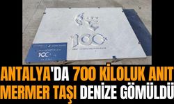 Antalya'da 700 kiloluk anıt mermer taşı denize gömüldü