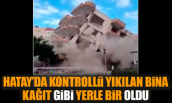 Hatay’da kontrollü yıkılan bina kağıt gibi yerle bir oldu