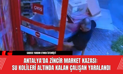 Antalya'da Zincir Market Kazası: Su Kolileri Altında Kalan Çalışan Yaralandı