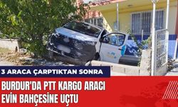 Burdur'da PTT kargo aracı evin bahçesine uçtu