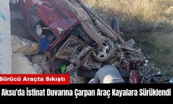 Aksu'da İstinat Duvarına Çarpan Araç Kayalara Sürüklendi