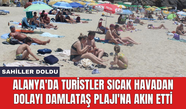 Alanya'da turistler sıcak havadan dolayı Damlataş Plajı'na akın etti