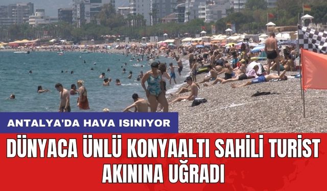 Antalya'da hava ısınıyor: Dünyaca ünlü Konyaaltı Sahili turist akınına uğradı